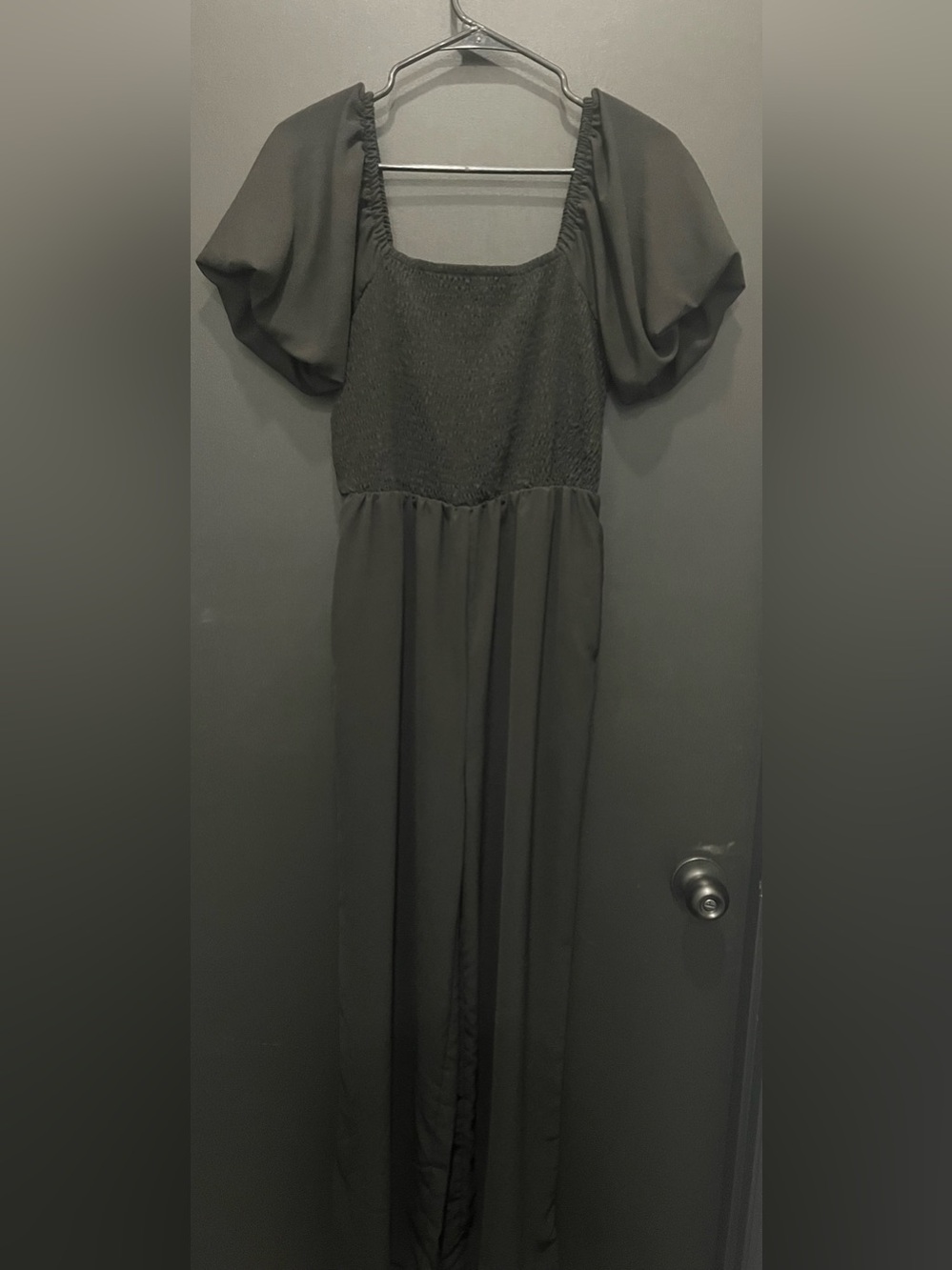 Elegant Black Romper with Puff Sleeves and Smocked Bodice